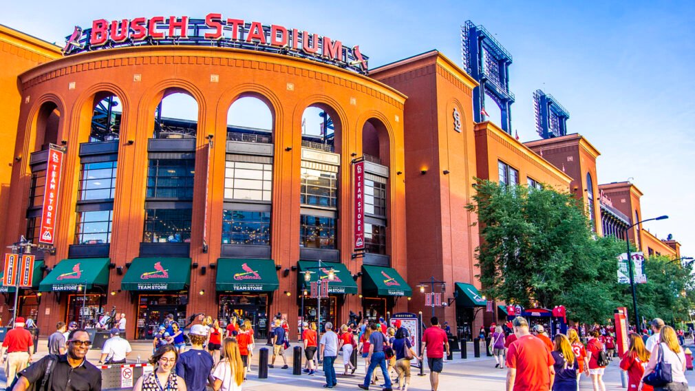 St. Louis, MO—June 6, 2018 crowds walk outside of baseball stadium prior to game. Busch Stadium is home to Major League Baseball’s Saint Louis Cardinals team.